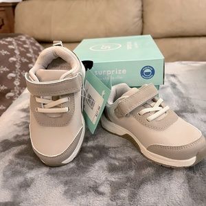 Kids Velcro shoes. Grey. A few sizes available. Brand new in box. Never worn.